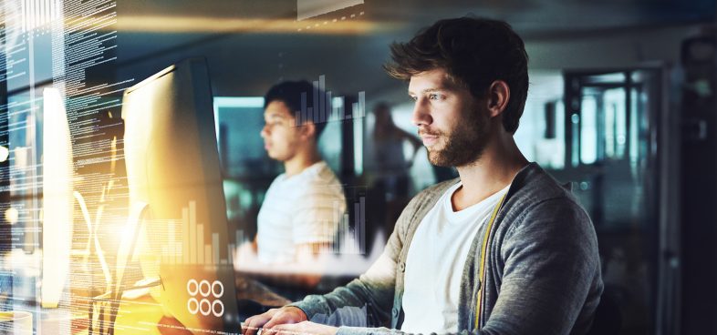 Pictorial representation of LLM content filtering efficacy. Two professionals working intently at computers in a modern office with digital graphs overlaying the image.